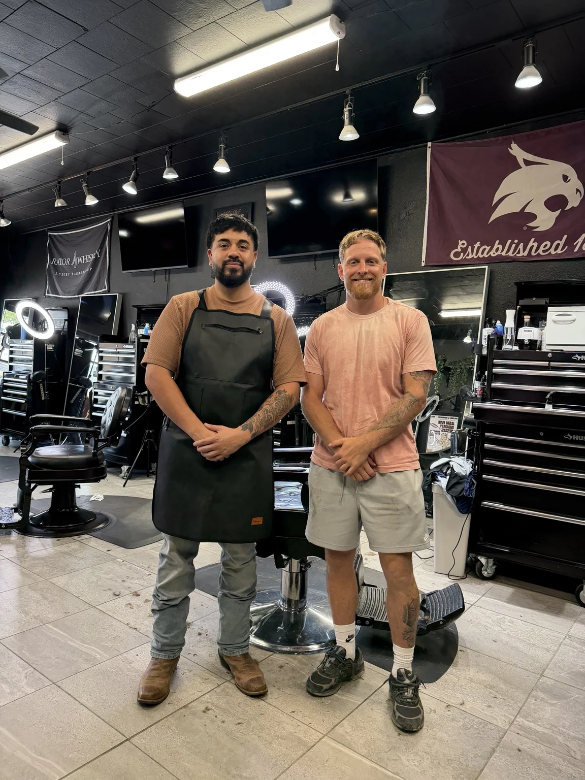 Real photo of Q with Cole Beasley at Razor & Whiskey Barbershop