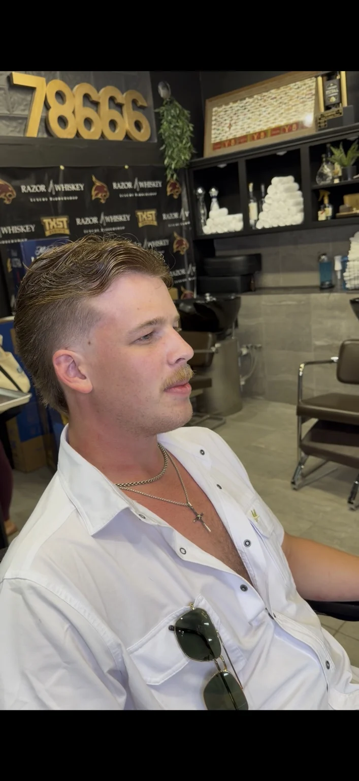 Modern fade and finished men’s cut by Q.tha_barber
